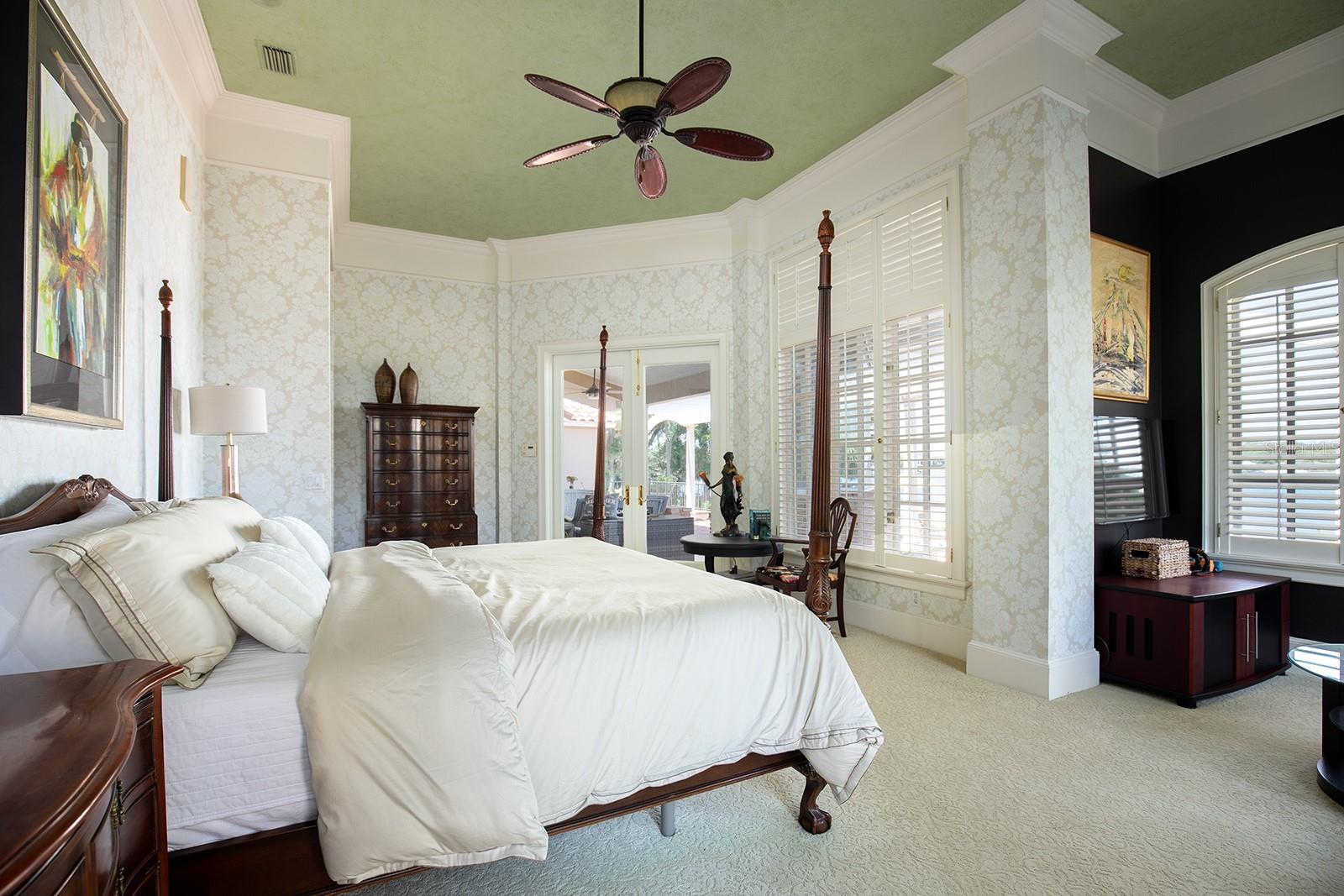Stunning pool and water views from your expansive master bedroom/ sitting room.