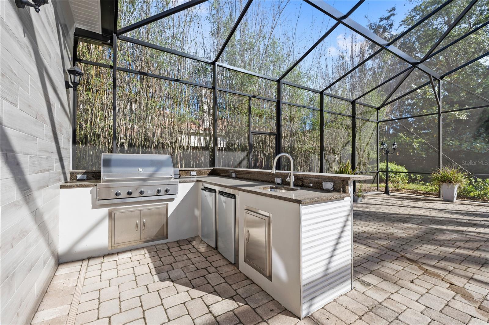 Built in outdoor kitchen to make outdoor entertaining a breeze!