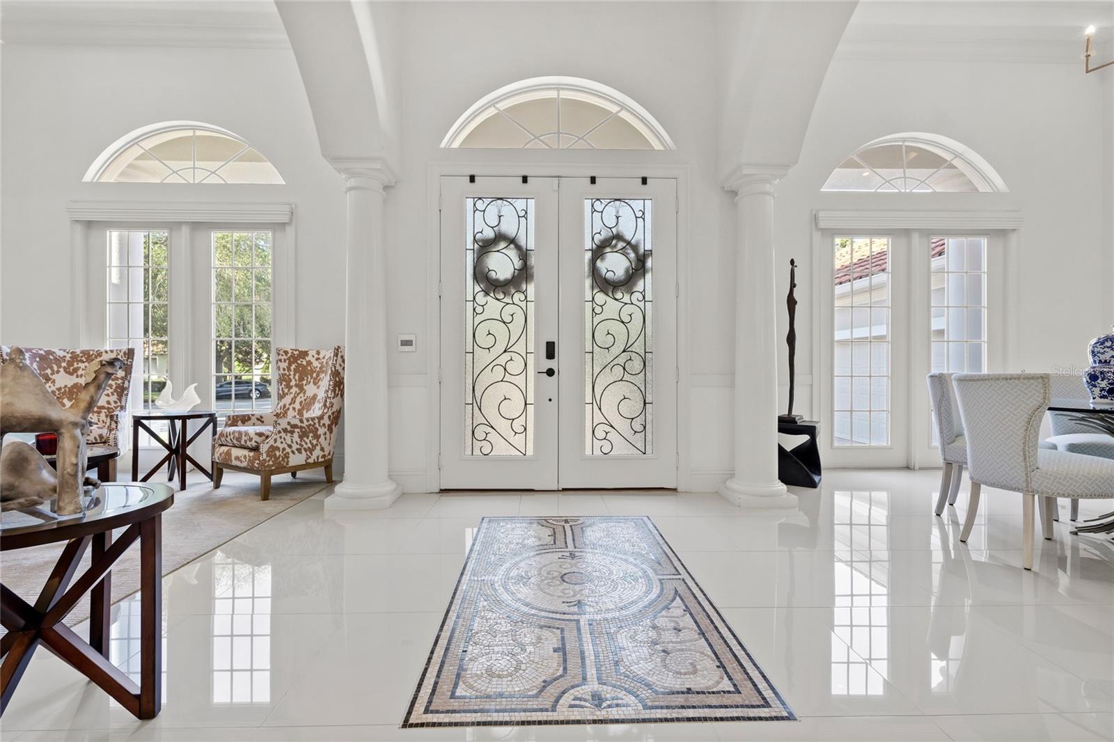Gorgeous double door entry with custom tile inlay Gorgeous double door entry with custom tile inlay
