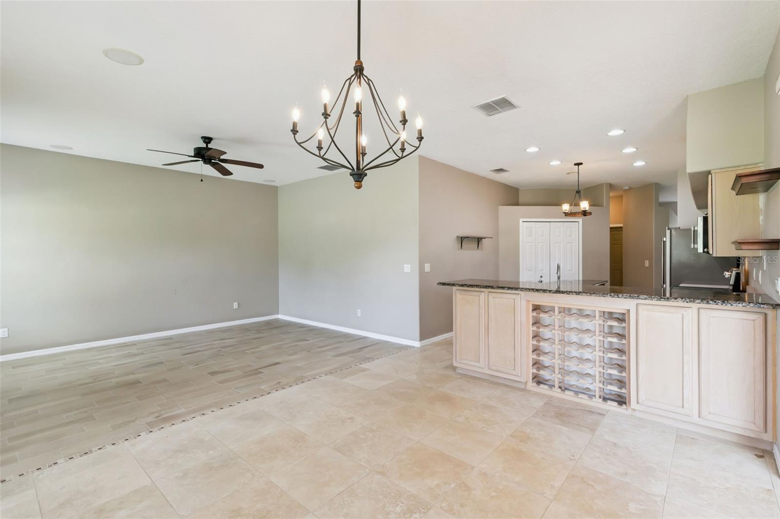 Living room joined with kitchen and extra space.