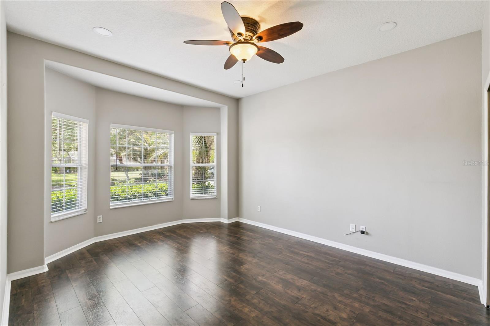 First bedroom on the left with bay window.