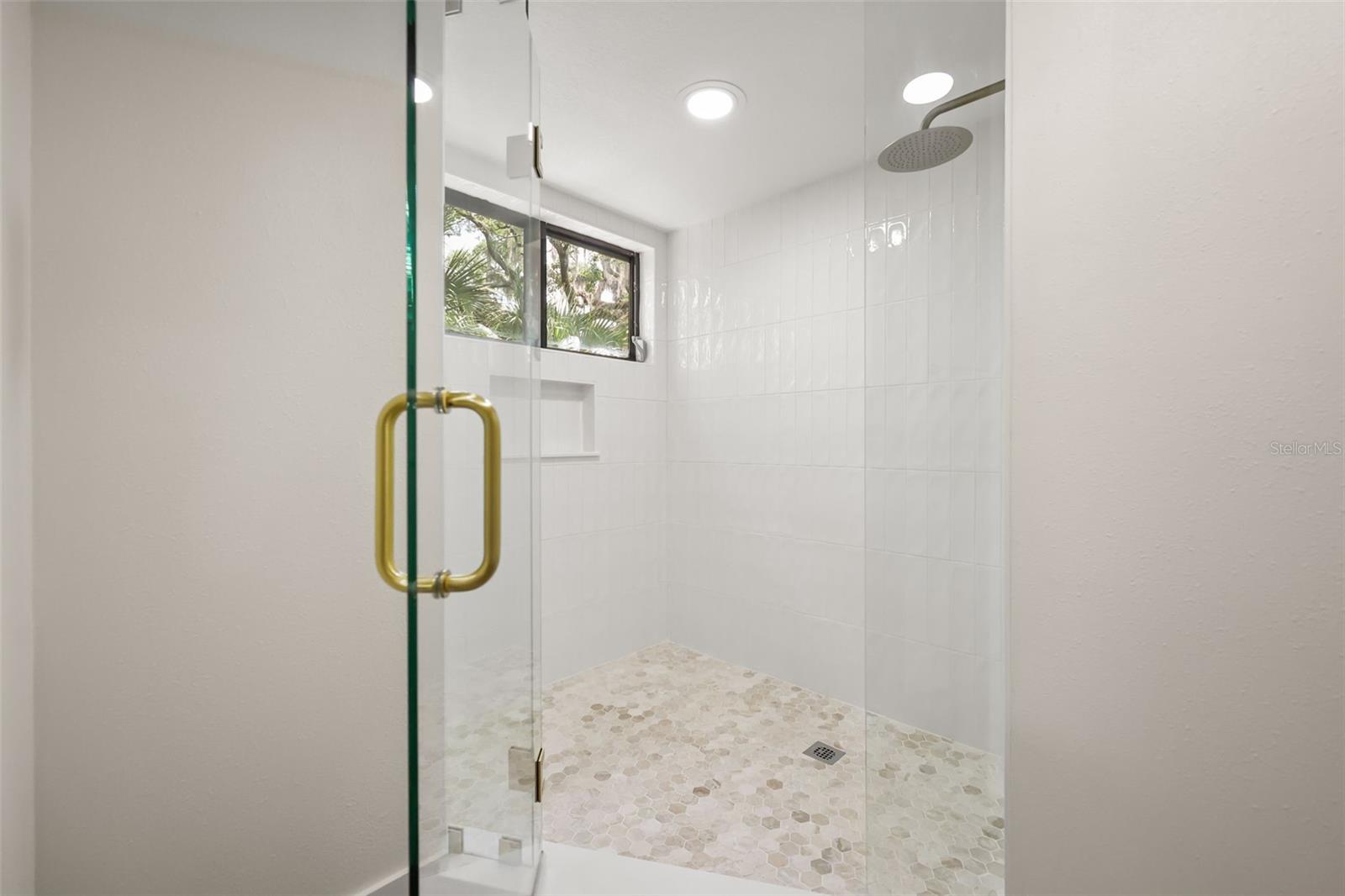 shower in primary en-suite bathroom
