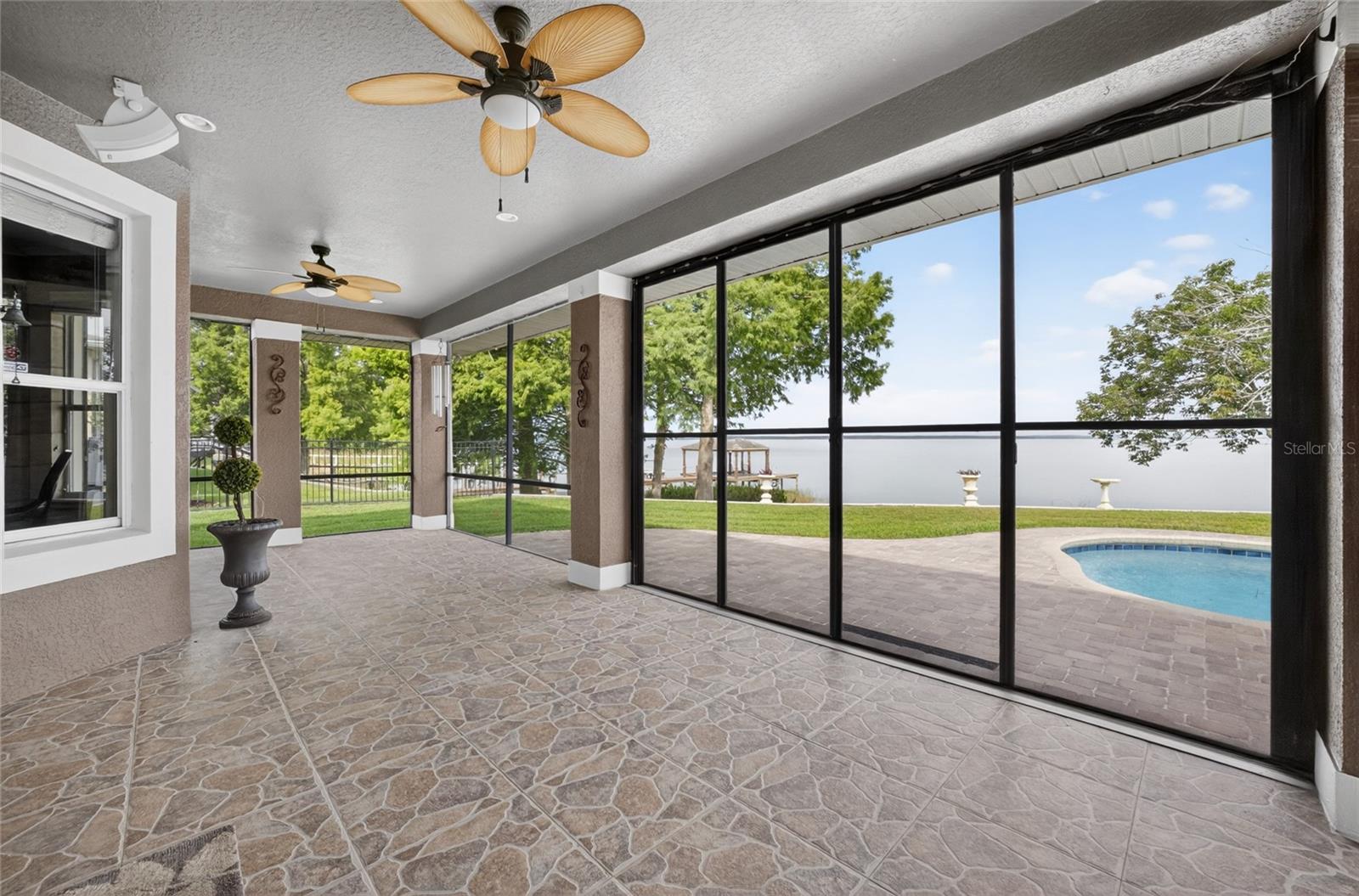 Covered screened patio with gorgeous lake views!