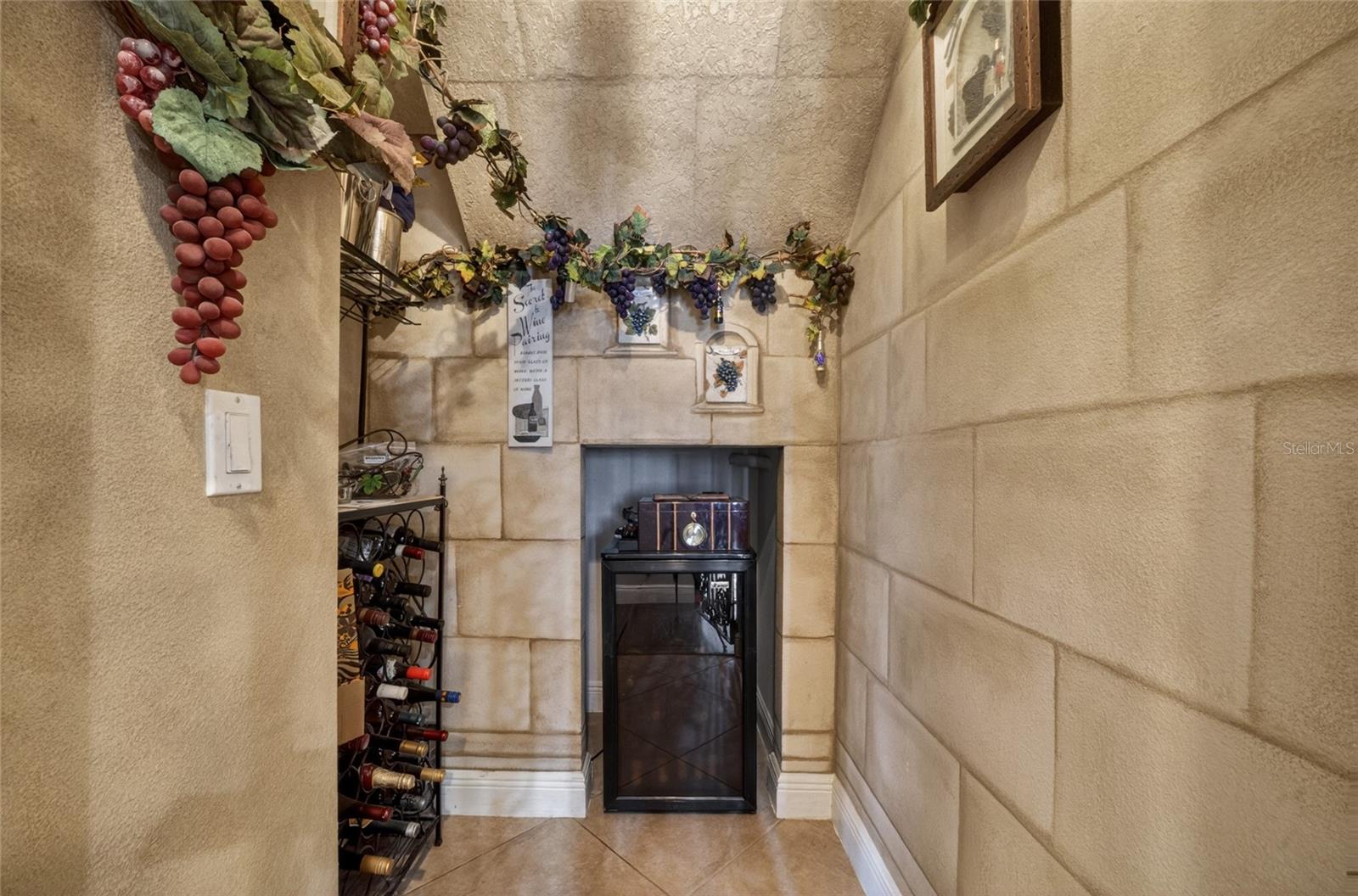 Wine alcove with wine refrigerator