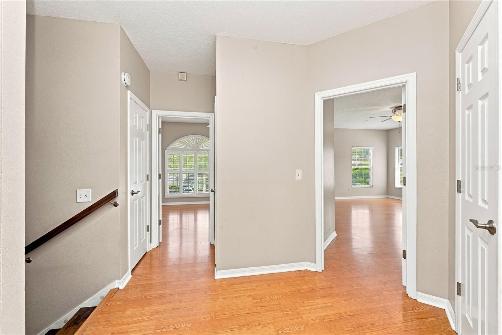 Second-Story Landing zone provides access to the upstairs bedrooms and creates additional flexibility for a reading area or workspace plus 3 additional storage closets!
