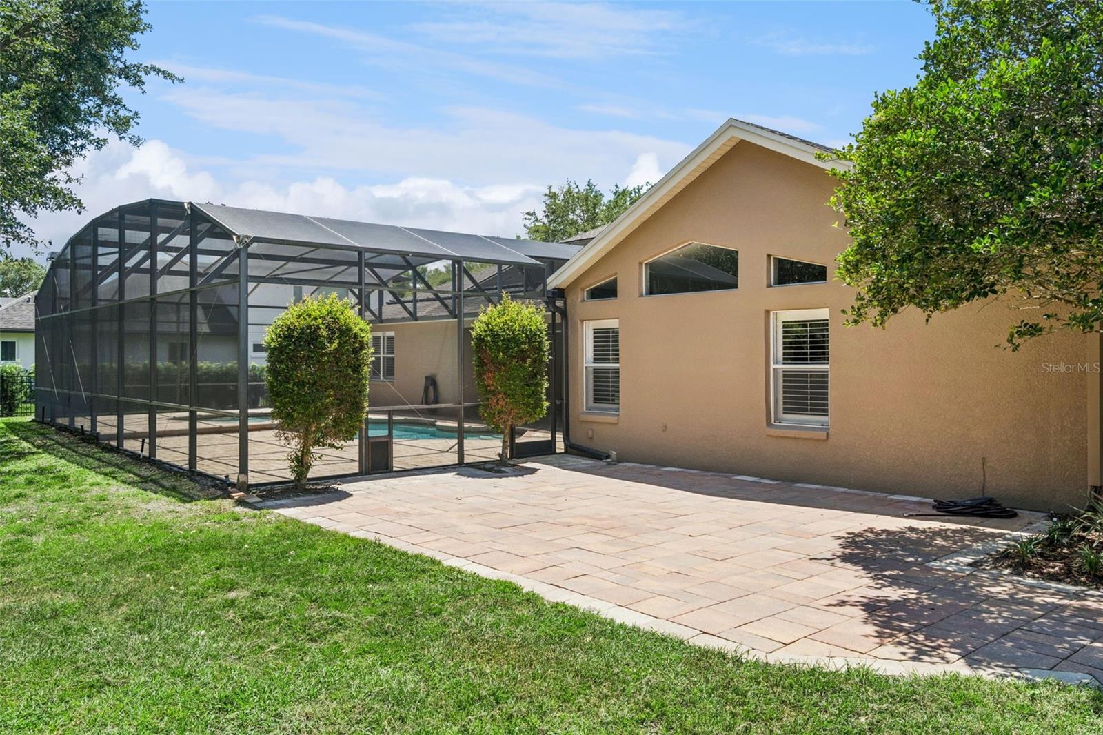 OPEN PATIO WITH BRICK PAVERS
