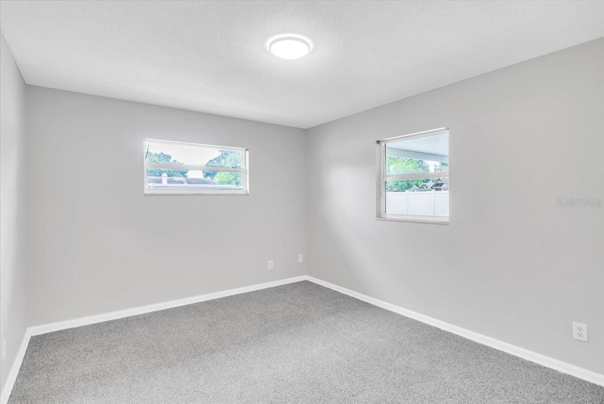 Bedroom #4 with new carpeting and paint.