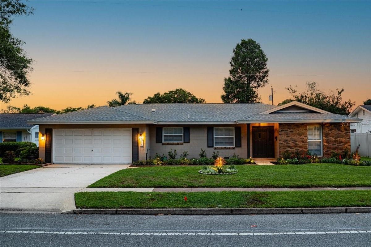 Front of home at twilight.