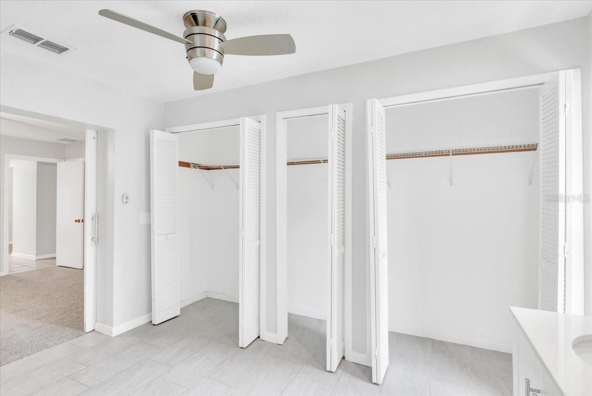 Primary bathroom storage closets.