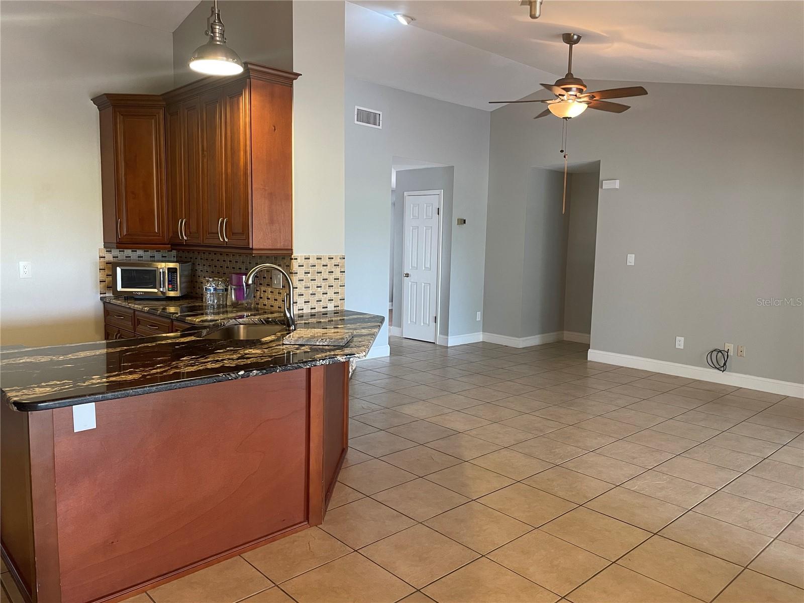 Breakfast bar with granite countertops
