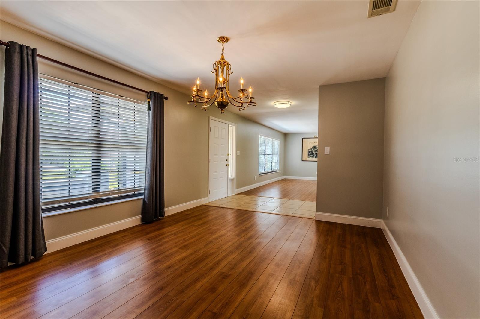 Formal dining room off foyer with access to the kitchen