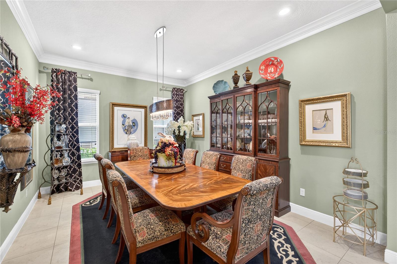 Dining room featuring elevated ceilings.