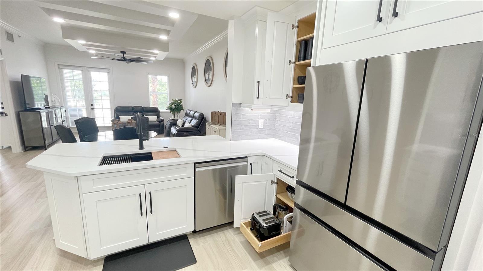 Kitchen with pull out appliance drawer