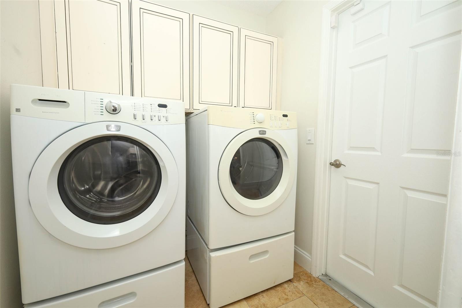 Inside laundry room.