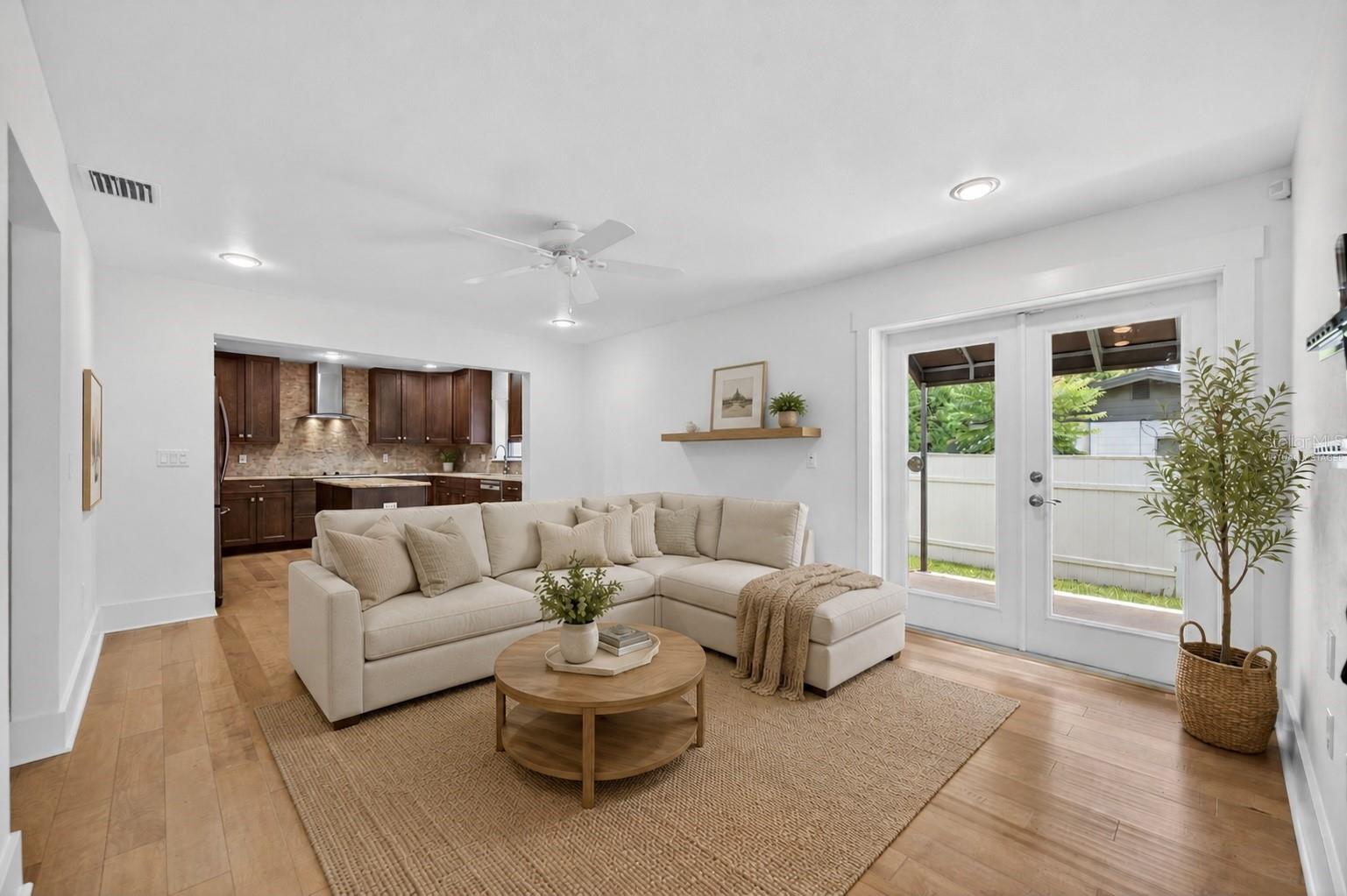 Open living room & kitchen - virtually staged