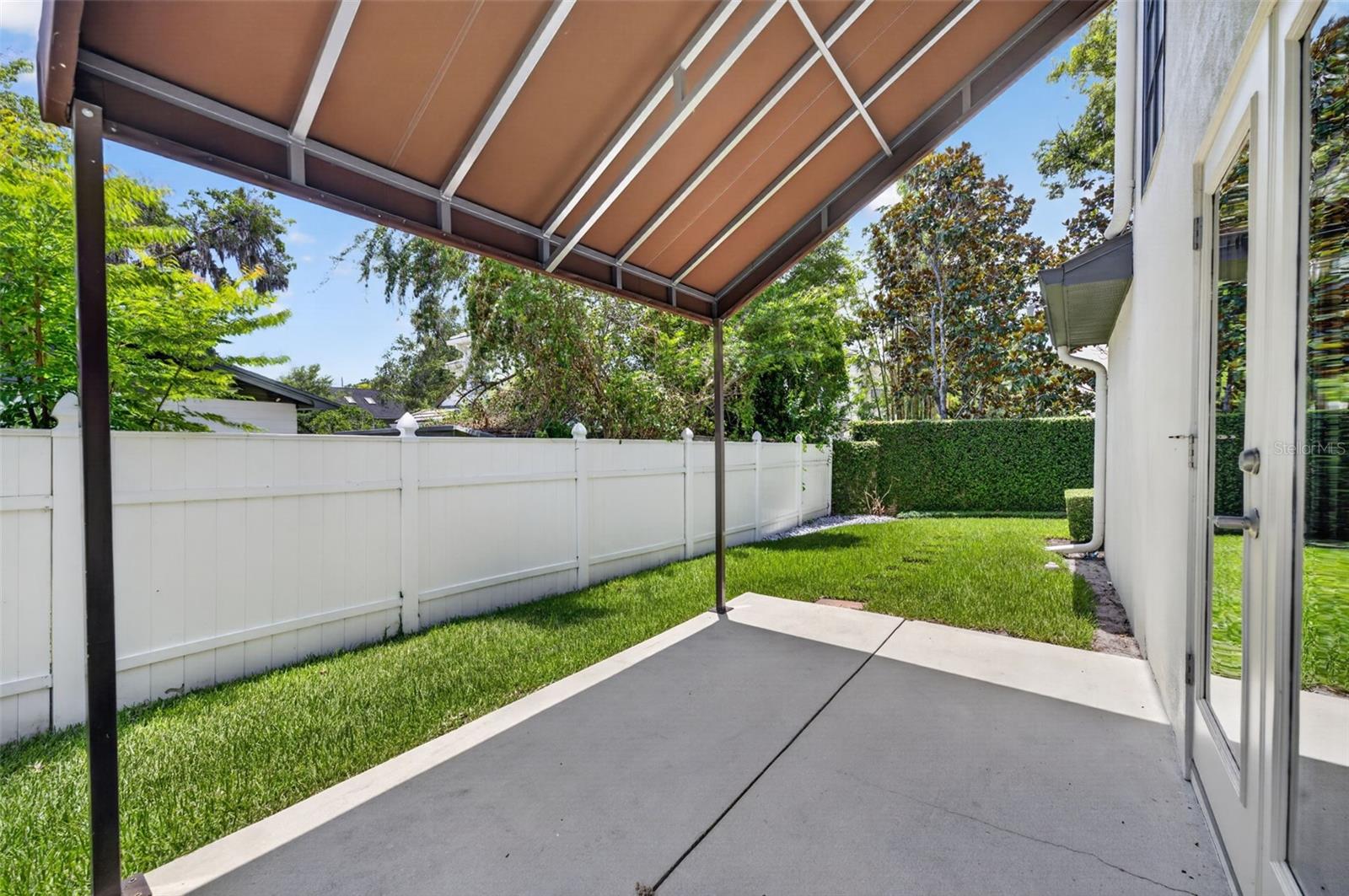 Deck with awning in side yard