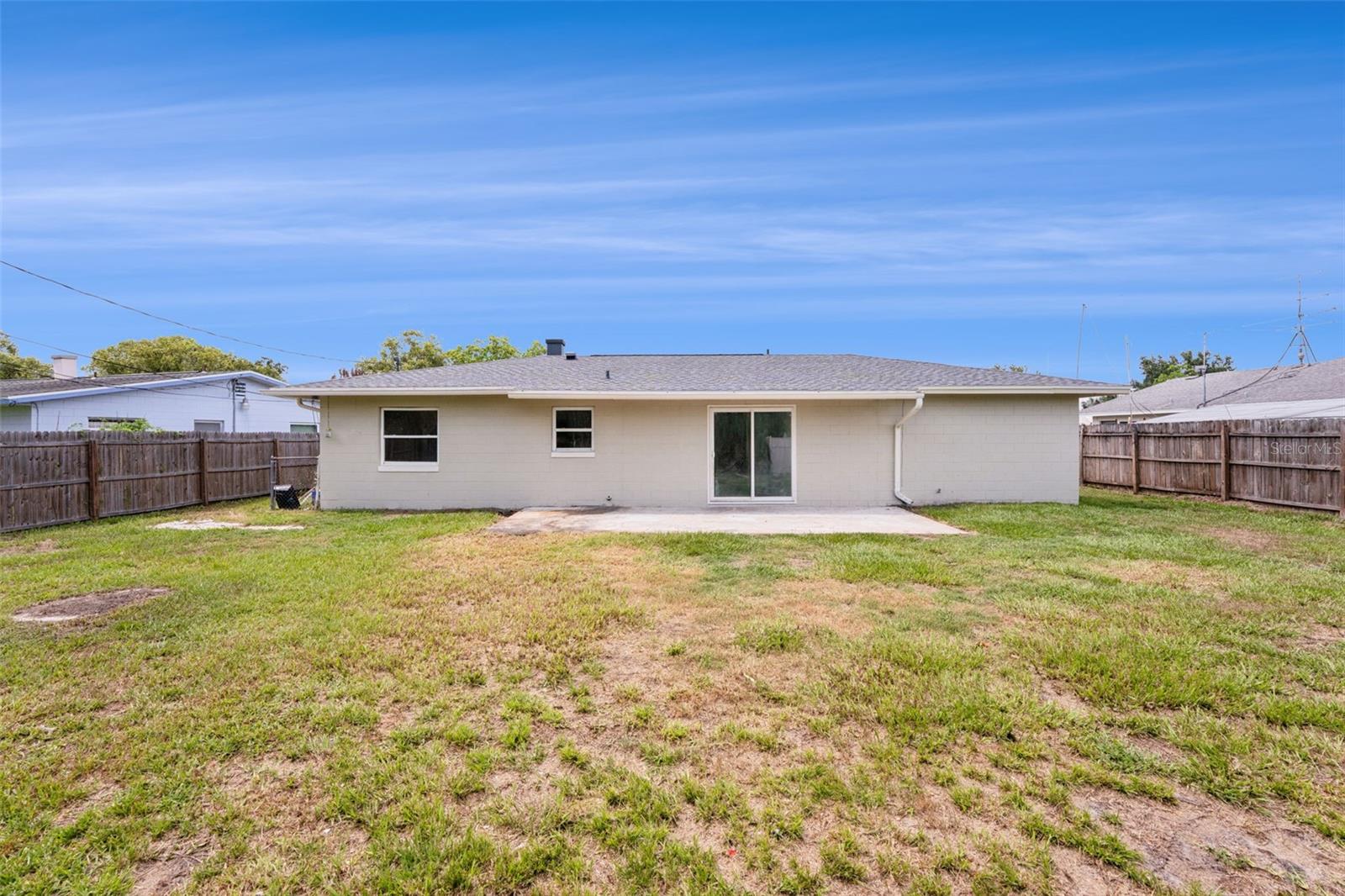 Large Fenced-in Back Yard with Patio