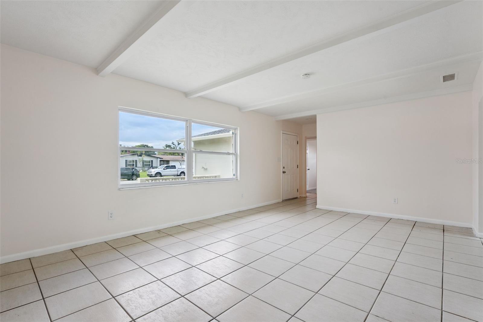 Light-filled Living Room with Tile Floors