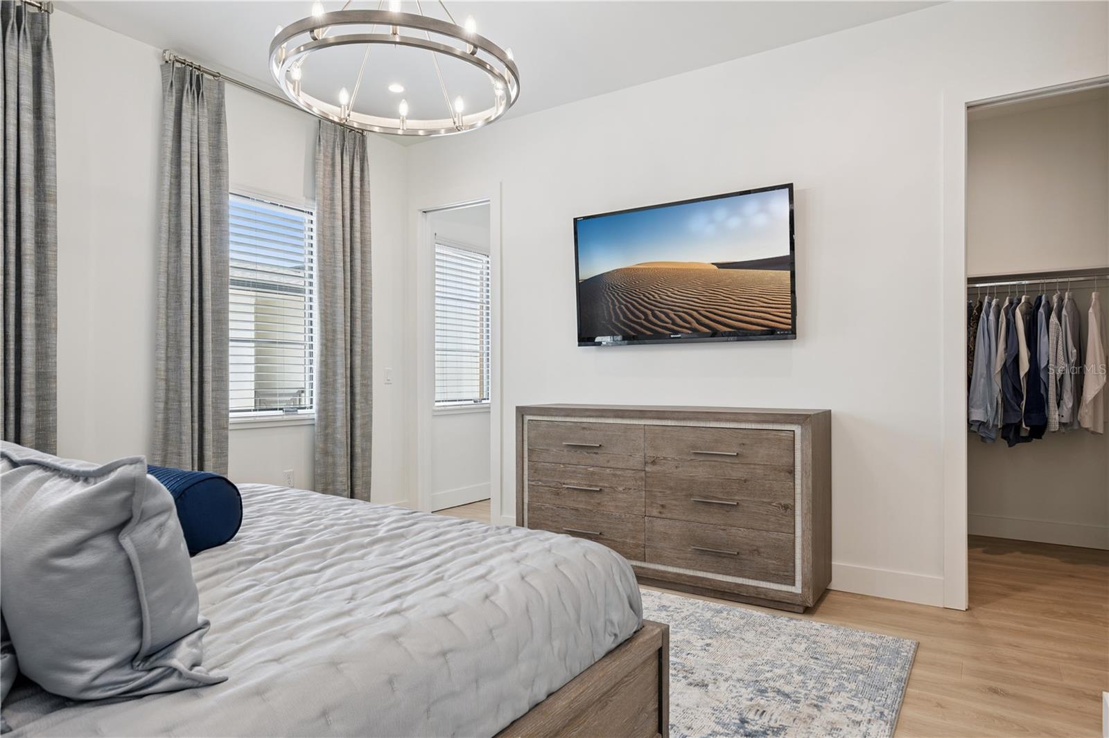 Primary Bedroom with Two Spacious Walk-In Closets and Ensuite