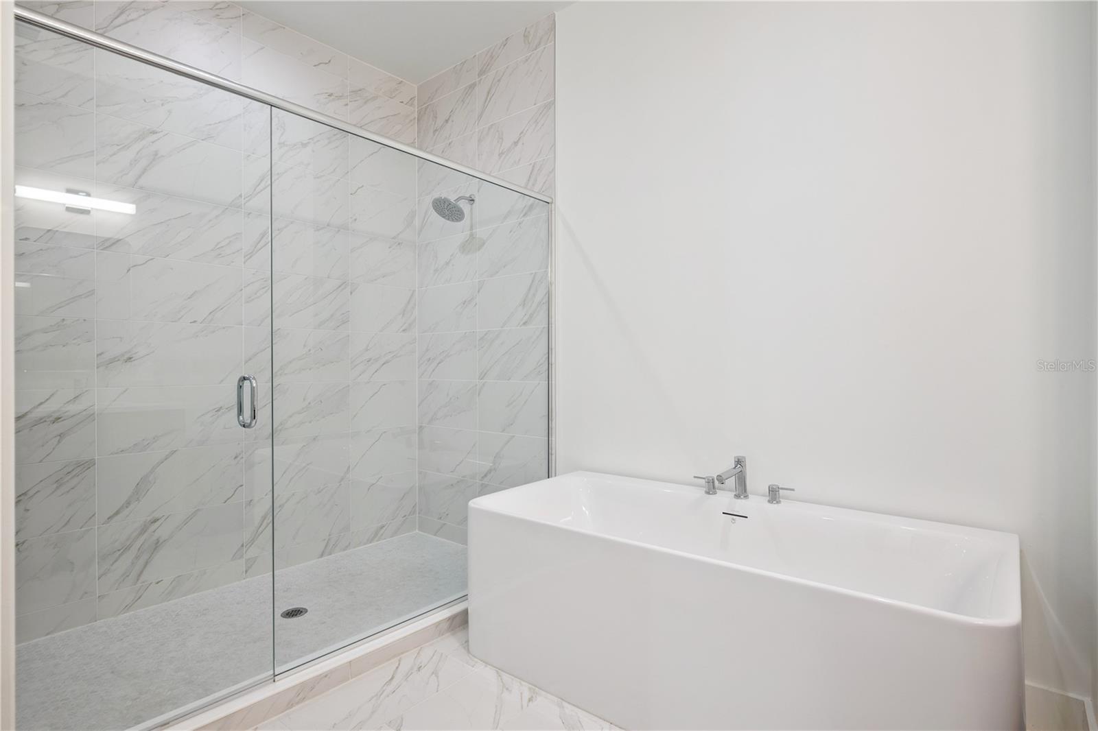 Primary Bath with Dual Sinks/Soak-in Tub and Large Walk-In Shower