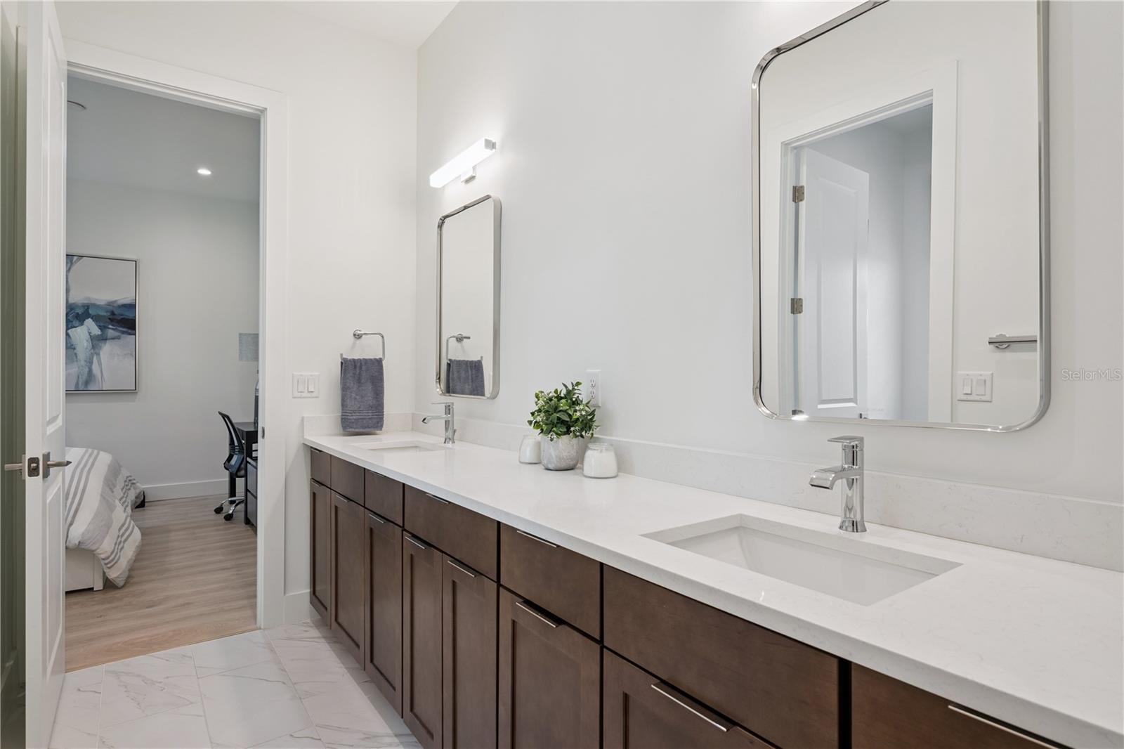 Shared Ensuite with Dual Sinks that services Bedrooms Two and Three