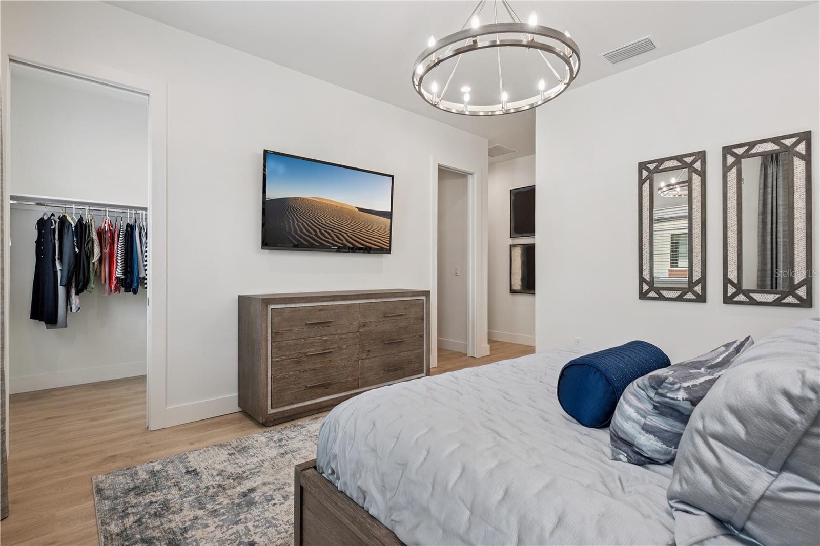 Primary Bedroom with Two Spacious Walk-In Closets and Ensuite