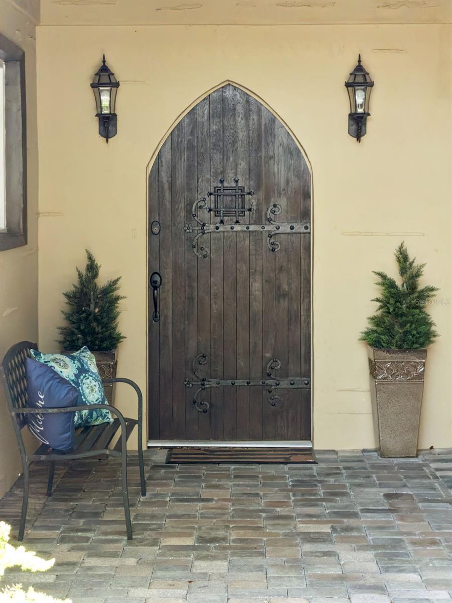 Step through a beautiful antique church door, rich with history and craftsmanship, and immediately feel that youre entering somewhere truly special