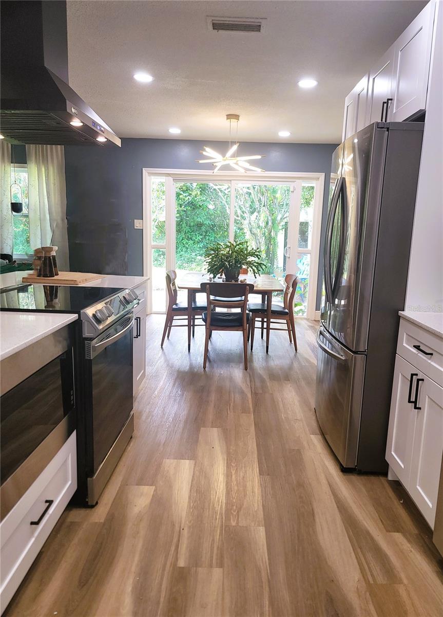 SS appliances and hard floors thru-out. Lots of natural light and pretty back-yard views