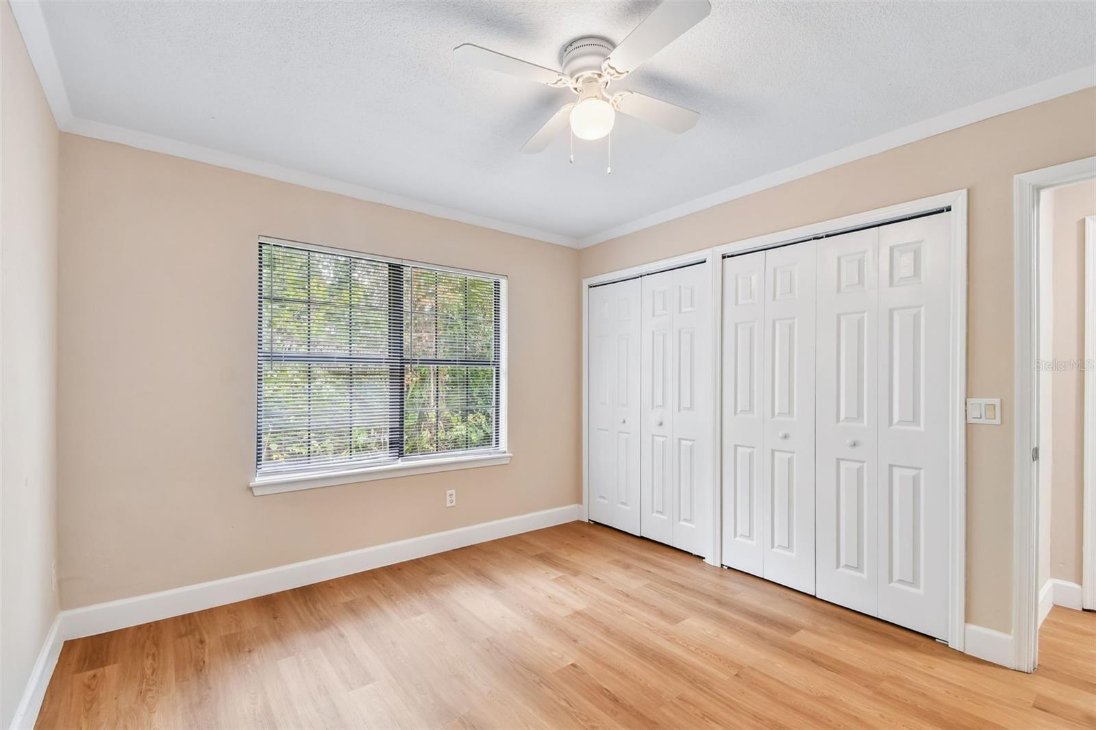 Bedroom 2 with dual closets