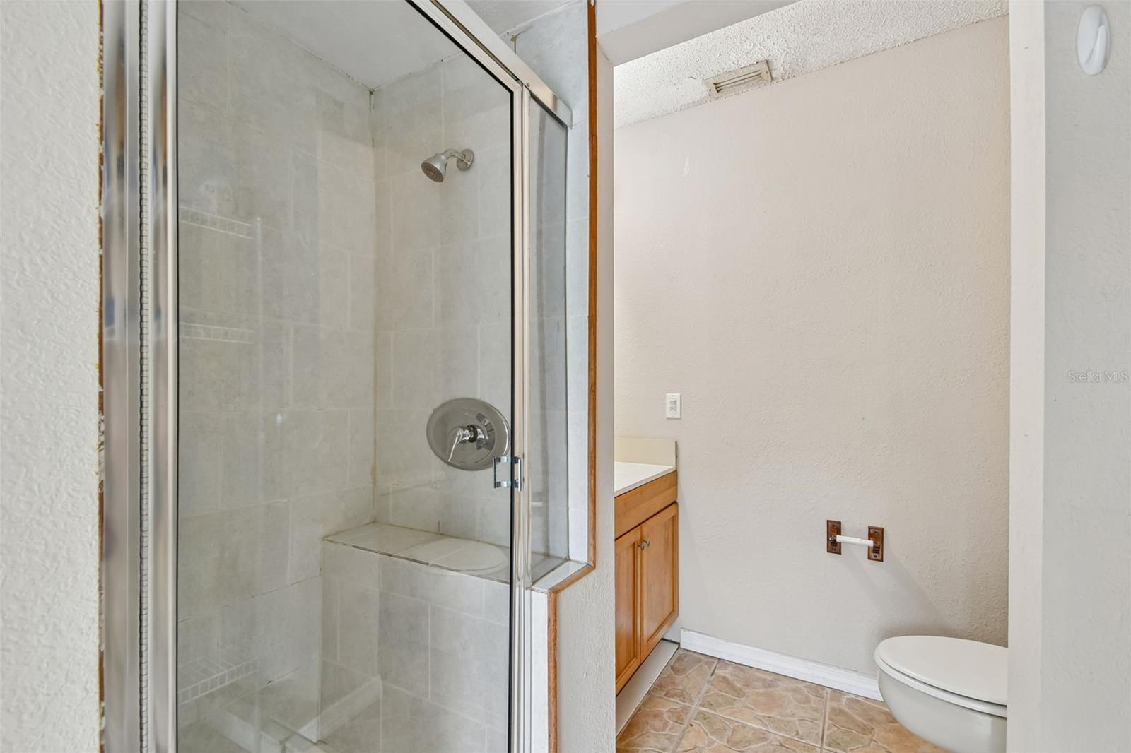 Pool Bathroom - Full with toilet, vanity, and Shower