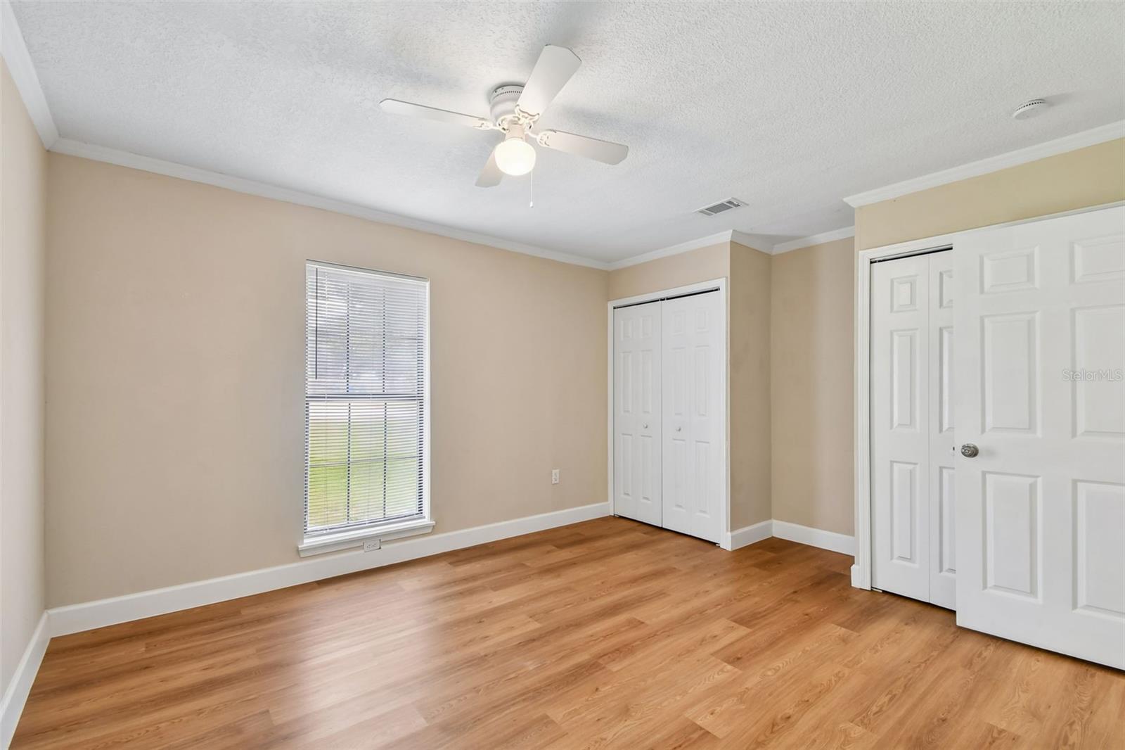 Bedroom 3 with dual closets