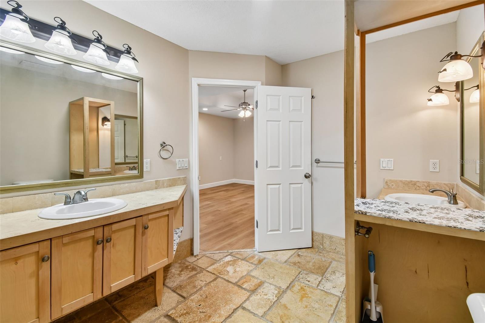 Primary Bathroom with dual vanity and shower