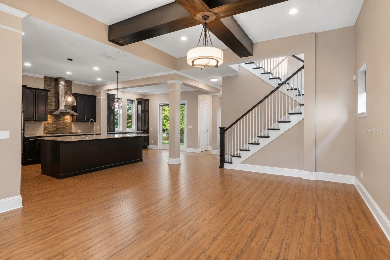 AI-edited to remove furniture to show the space