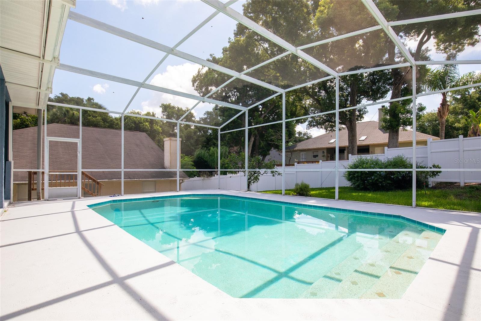 Large sparkling screened pool
