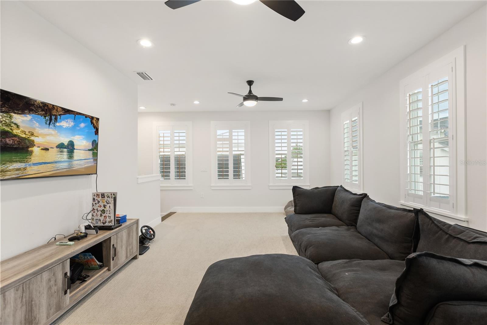 SECOND-FLOOR LOFTThe expansive 25'  15' second-floor loft creates a separate gathering space for movies, gaming, homework or lounging, apart from the main living areas downstairs.