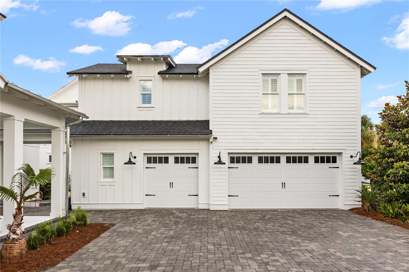 907 SQ FT GUEST HOUSE APARTMENT.Above the garage, the carriage house apartment has a private entrance, kitchenette and full bathideal as an in-law suite, guest house or multigenerational living space. A dedicated golf-cart bay completes the garage.