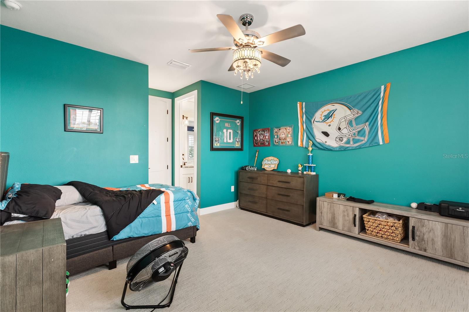 REAR-FACING SECOND-FLOOR BEDROOMGenerous proportions, multiple windows and plantation shutters bring abundant natural light to this bedroom, which also includes a walk-in closet and direct Jack & Jill bath access.