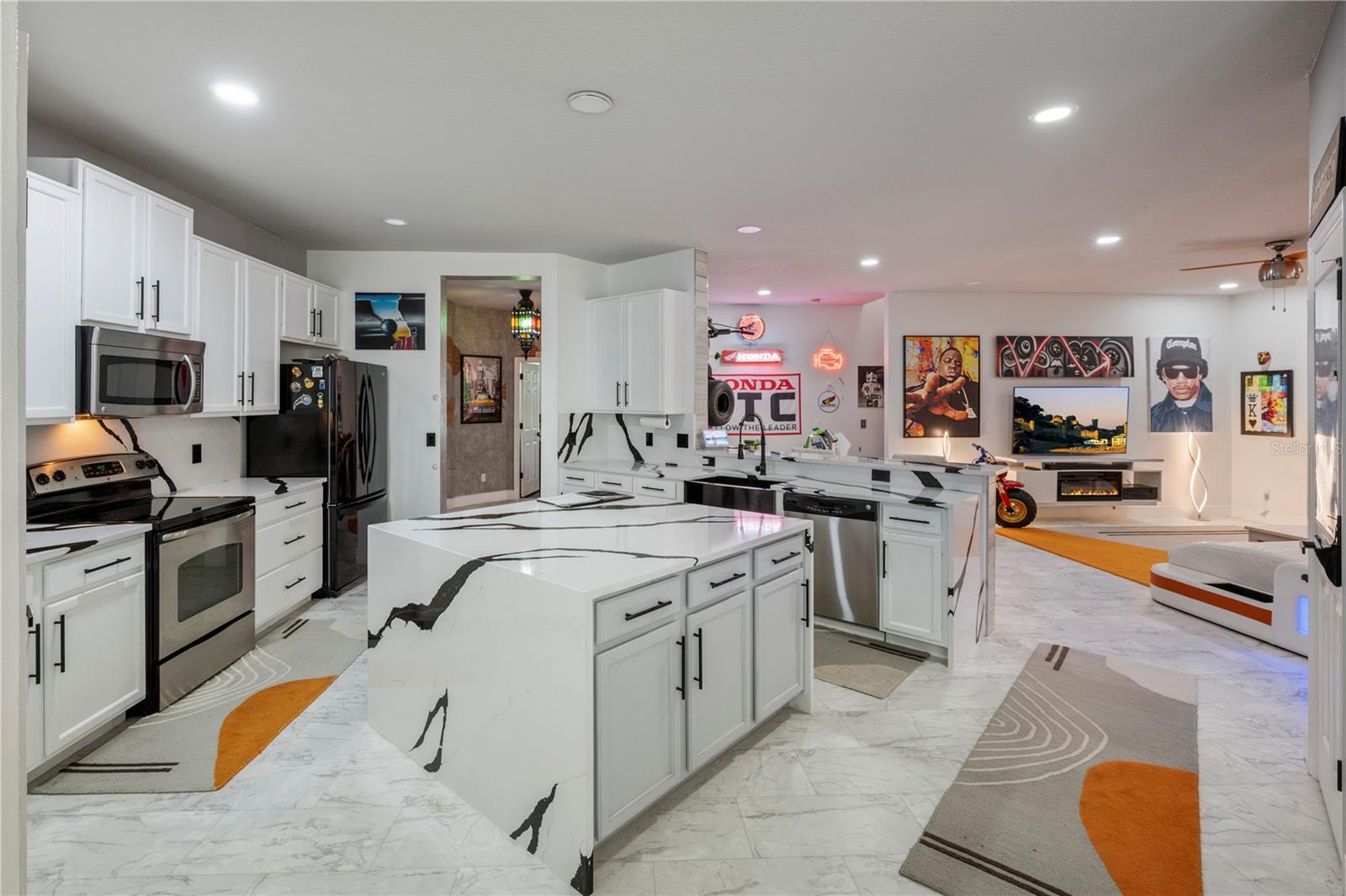 Stunning black and white quartz countertops and backsplash!