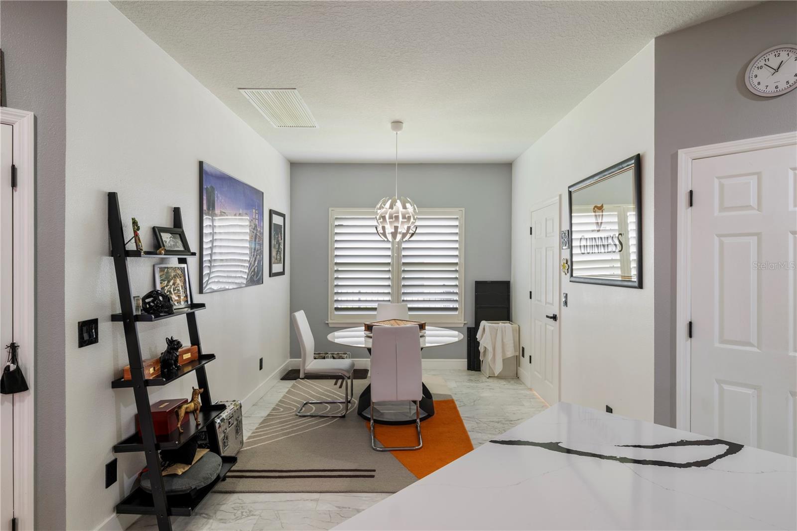Breakfast nook off of the kitchen, double pantries, access door to laundry room and 3 car garage.