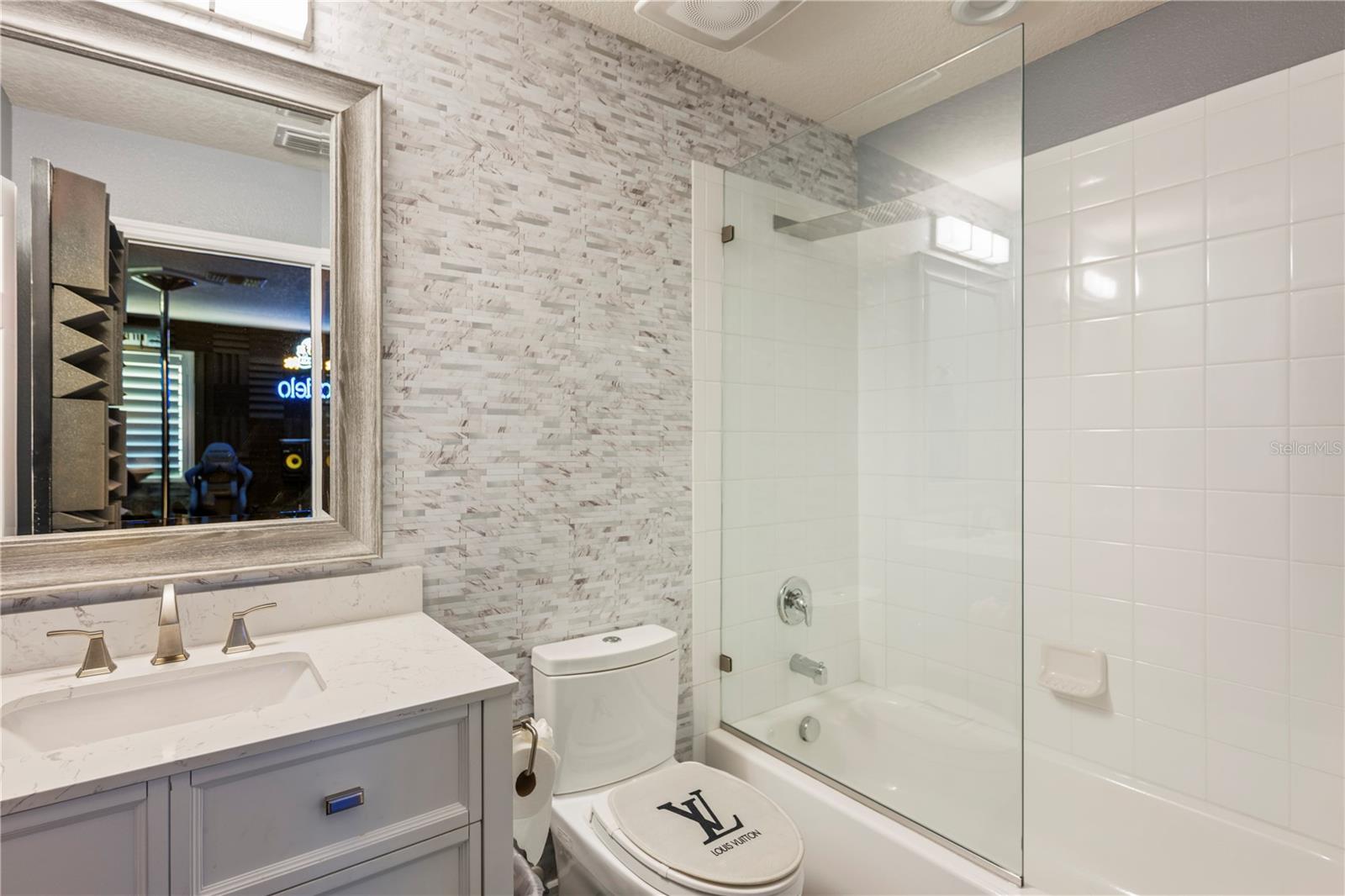 Upstairs Full Bath adjoining the Bonus Room.