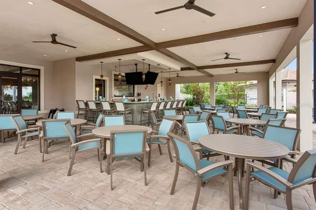 Resort-style living at ChampionsGate! Enjoy incredible community amenities including resort pools, a lazy river, water slides, splash areas, clubhouse, fitness center, dining, sports courts and moreall designed to make every day feel like a vacation.