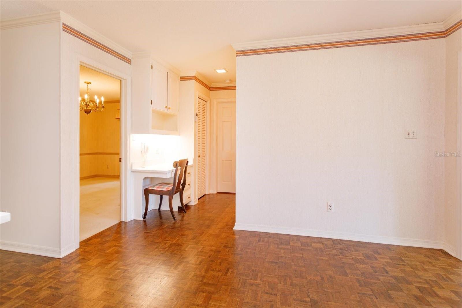 Kitchen has desk, pantry closet, access to Dining a 1/2 Bath and direct access to garage