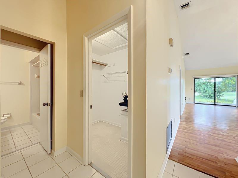 Foyer Showing Guest Bath, Inside Storage & Golf Course View