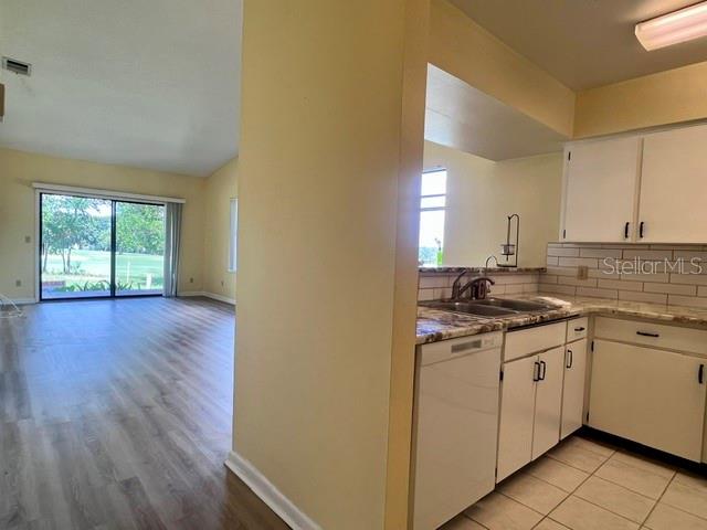 NEW LVP flooring in living area & bdrms.