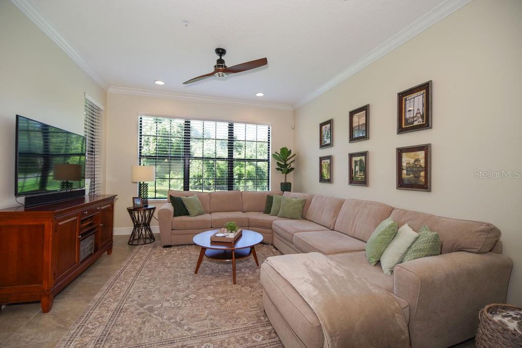 LIVING ROOM WITH VIEWS OF CONSERVATION, GOLF AND WATER