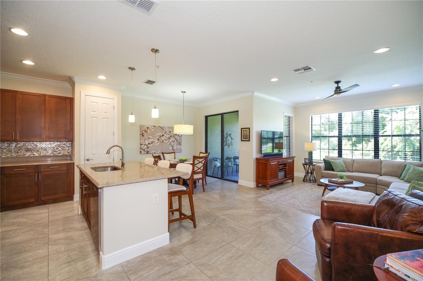 VIEWS OF KITCHEN, DINING AND LIVING ROOMS