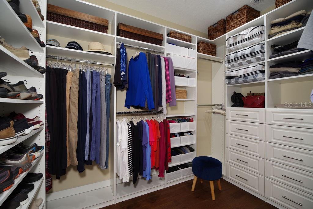 PRIMARY BEDROOM WALK-IN CUSTOM CLOSET