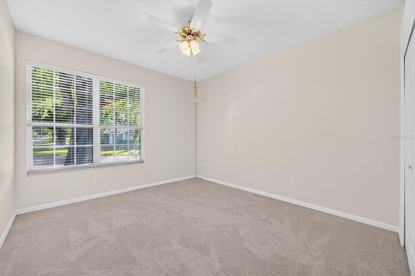 TWO ADDITIONAL BEDROOMS provide welcoming space for visiting family, overnight guests or hobbies, with a second full Bath nearby. Bedroom 2