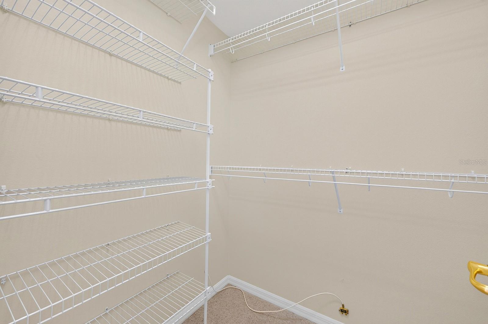 The Primary Suite boasts dual walk-in closets.