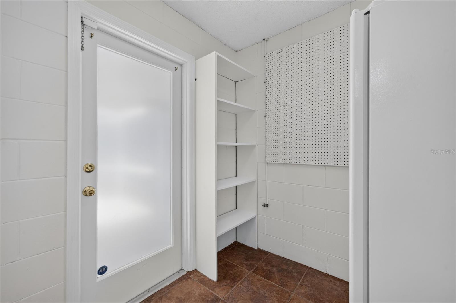 Additional utility room with refrigerator